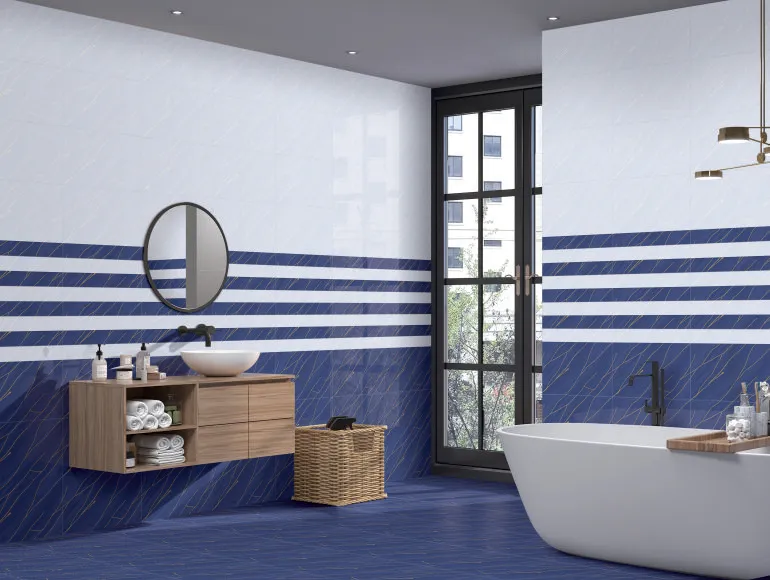 Modern marble bathroom design with SHG Azul Streak Dusk tiles, sink and window view